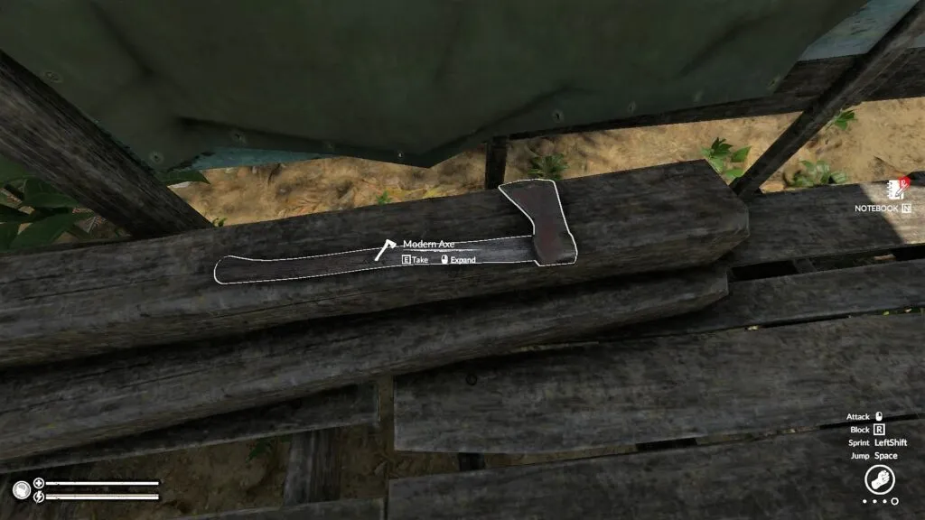 The Modern Axe Resting Atop a Wood Pile in Green Hell
