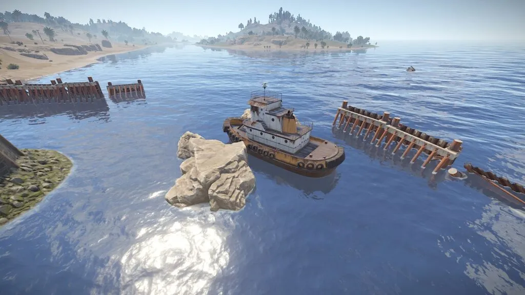RUST Ferry Terminal Monument — Seawalls and Dormant Tugboat