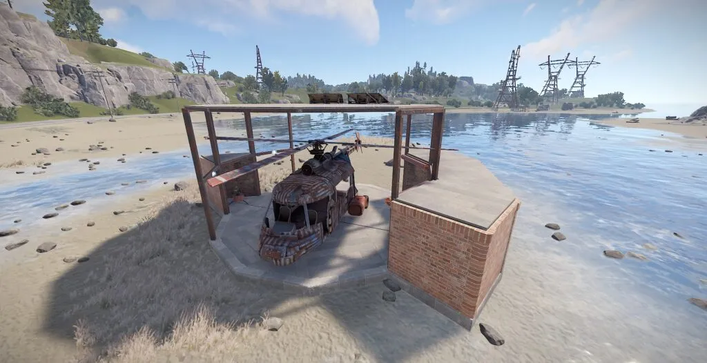 A Scrap Transport Helicopter Docked in a Player-Made Garage in RUST 